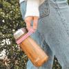 imageSwell Traveler Handle Fits All Traveler Sizes Onyx Comfortable Carrying On The Go Flexible Silicone Grip BPA FreePink Topaz