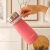 imageSwell Traveler Handle Fits All Traveler Sizes Onyx Comfortable Carrying On The Go Flexible Silicone Grip BPA FreeWhite Speckle
